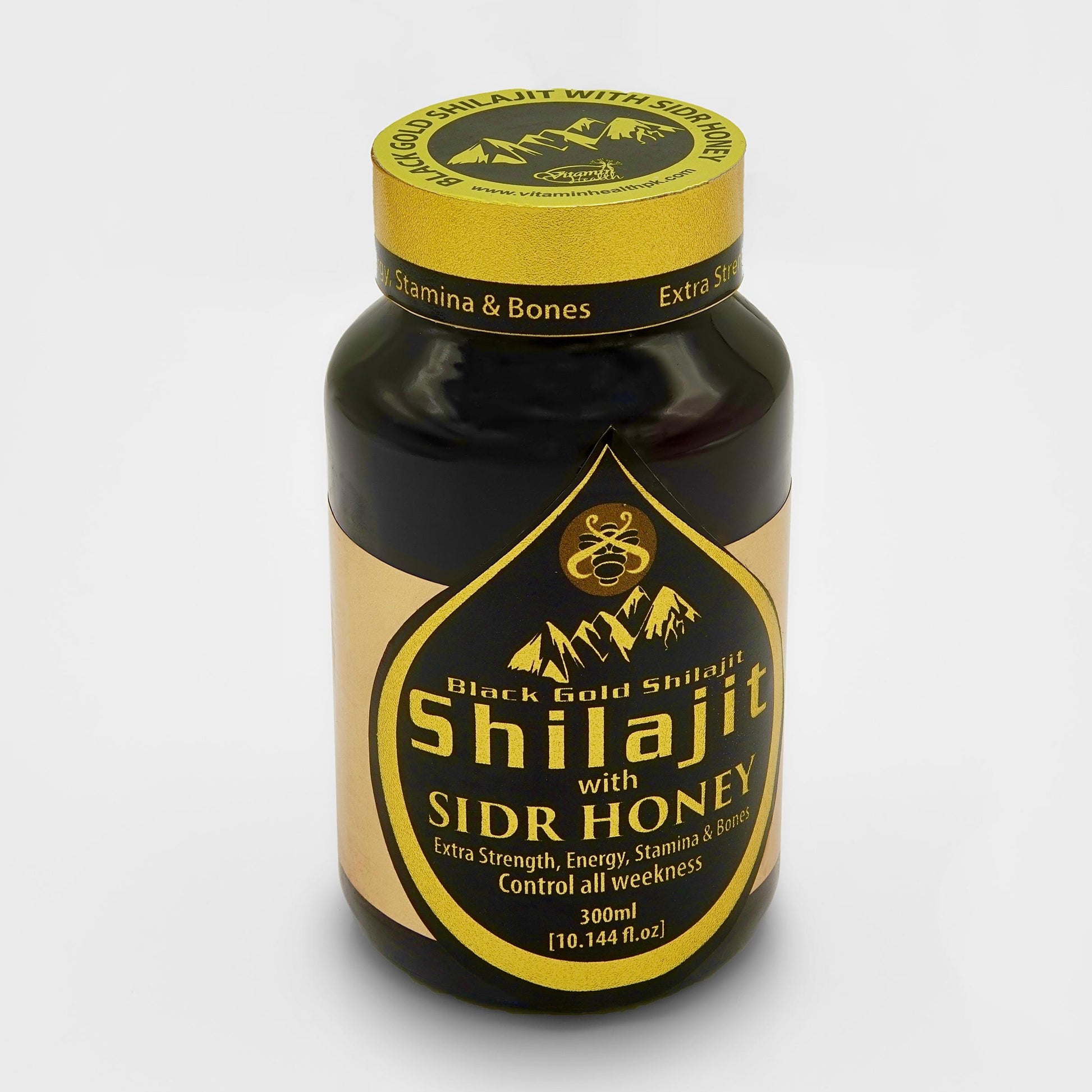 Bottle of Shilajit with Sidr Honey on a white background